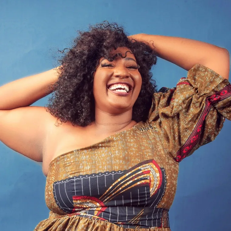 a woman of African descent posing for a headshot
